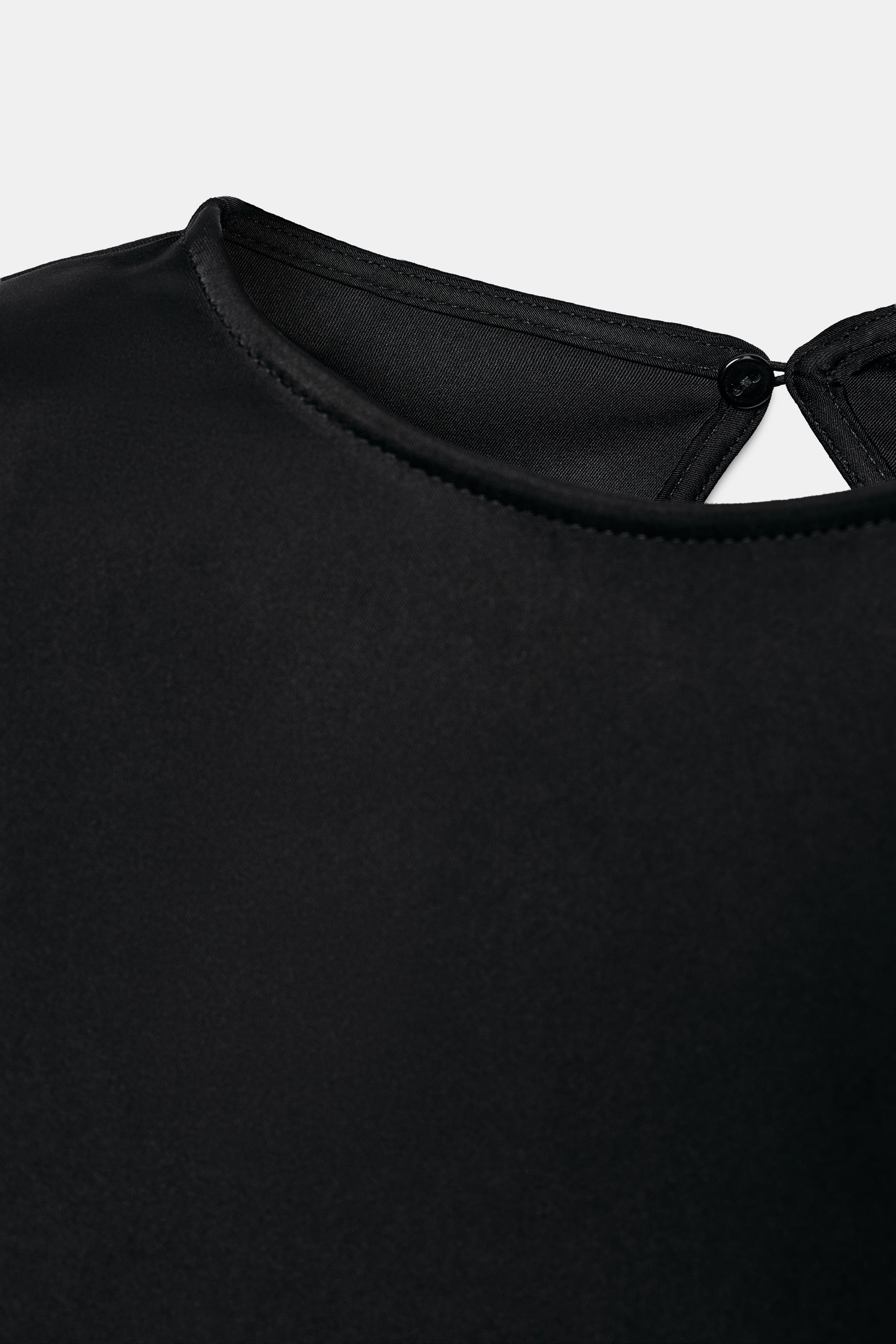 SATIN TOP WITH SHOULDER PADS AND STRAPS